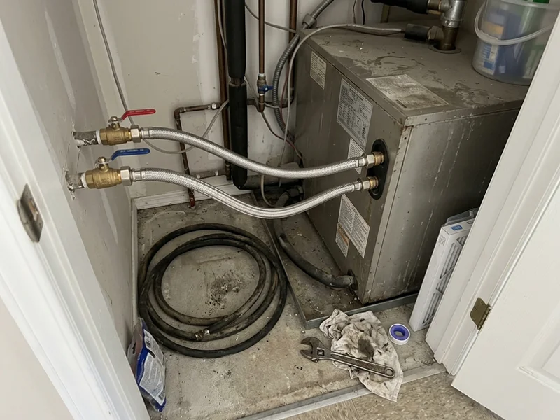New braided stainless hoses on a water-source heat pump